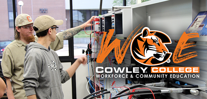 instructor and cowley college student using a machine tool