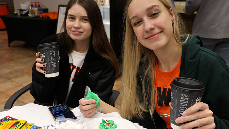 cowley college students making christmas cookies