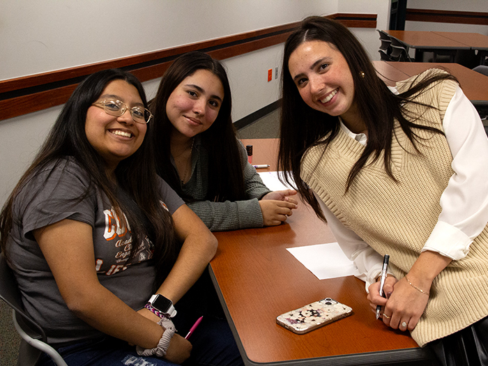 smiling students at a hope squad meeting