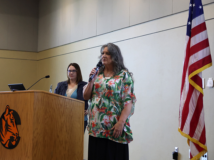 Julie Rhoads receiving Paul Stirnaman Award