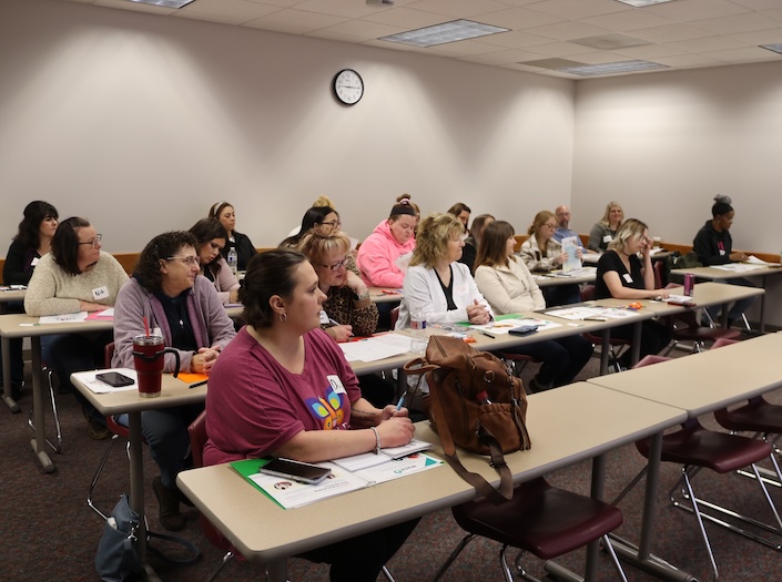 educators attending a presentation