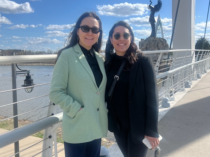 two women on a bridge