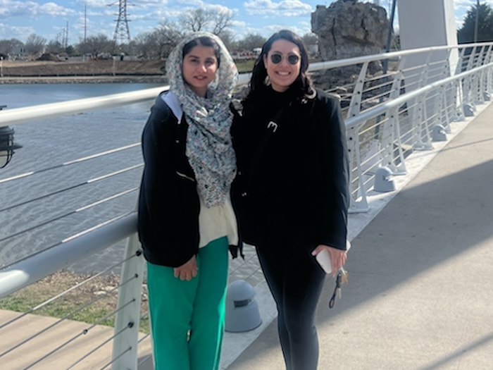 two women on a bridge