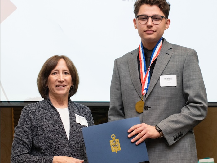 Cowley President Dr.Michelle Schoon and Drew Perez