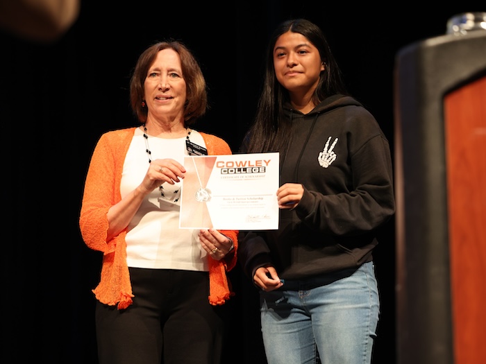 Kaylee Nacarrette receiving scholarship