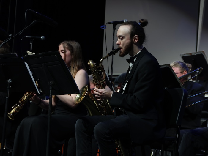 male saxaphonist performing