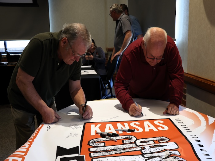 trustees signing banner