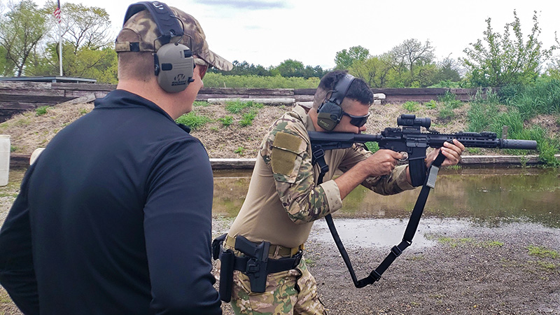 student at shooting range