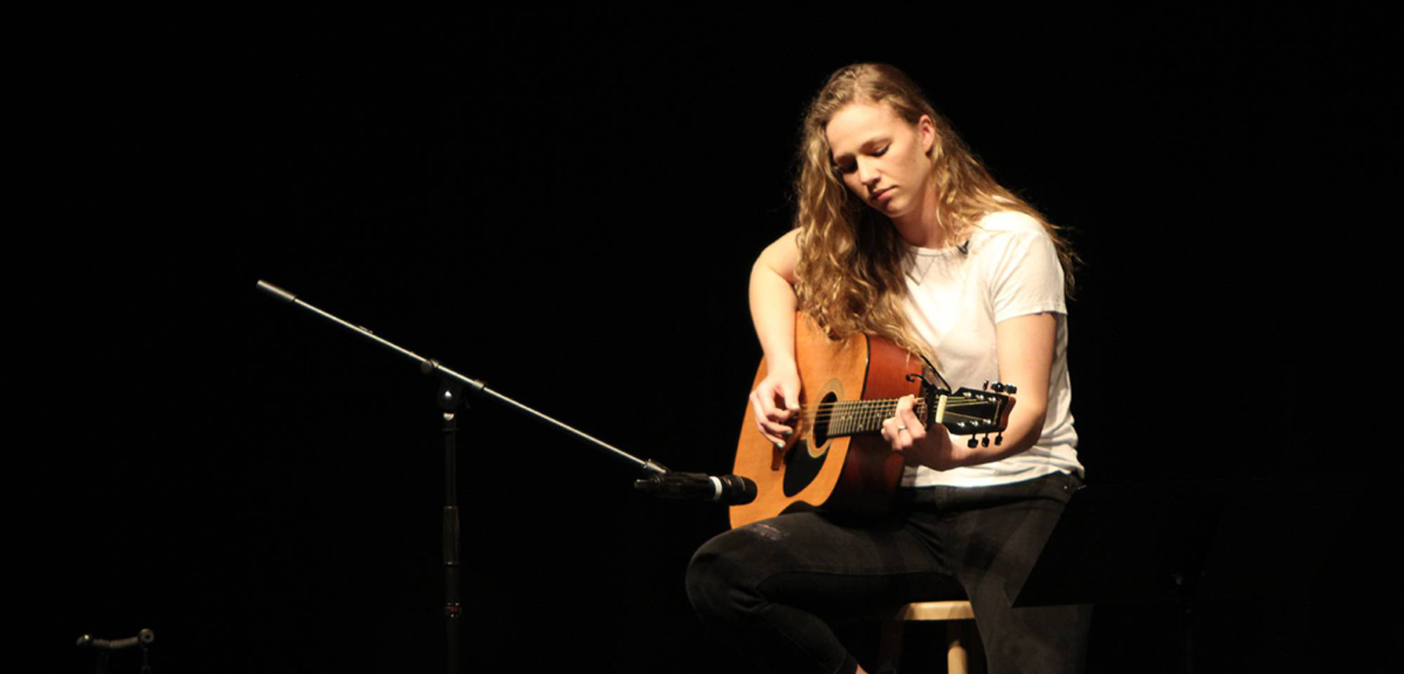 hannah nicolaisen playing guitar