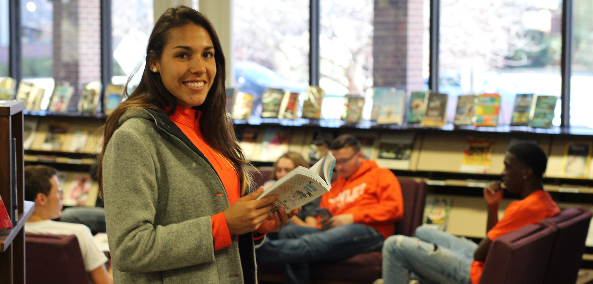 student in library